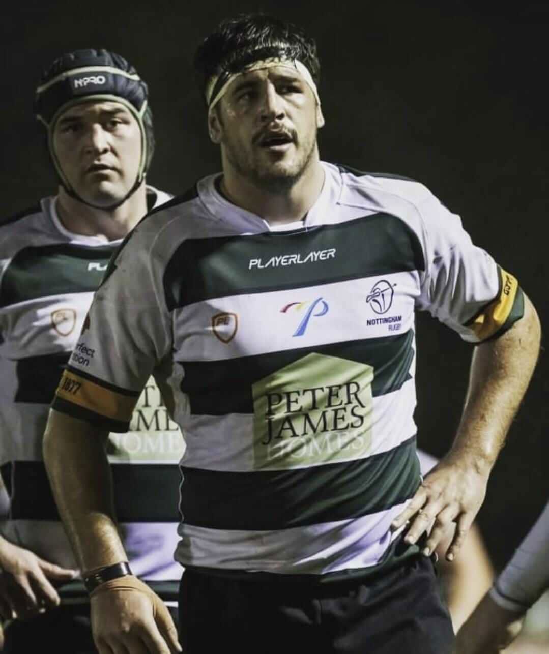 A man playing rugby